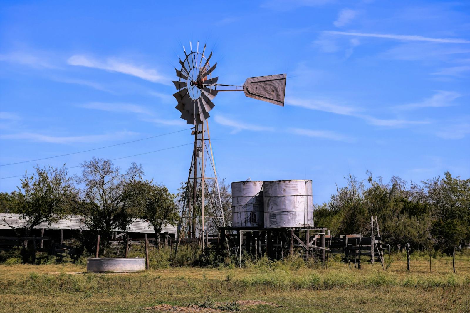 Old farm windmill and water tanks near Austin, Texas