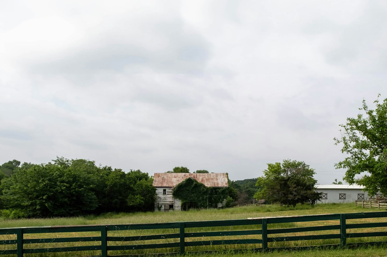 Farmhouse behind a board fence in McKinney, Texas
