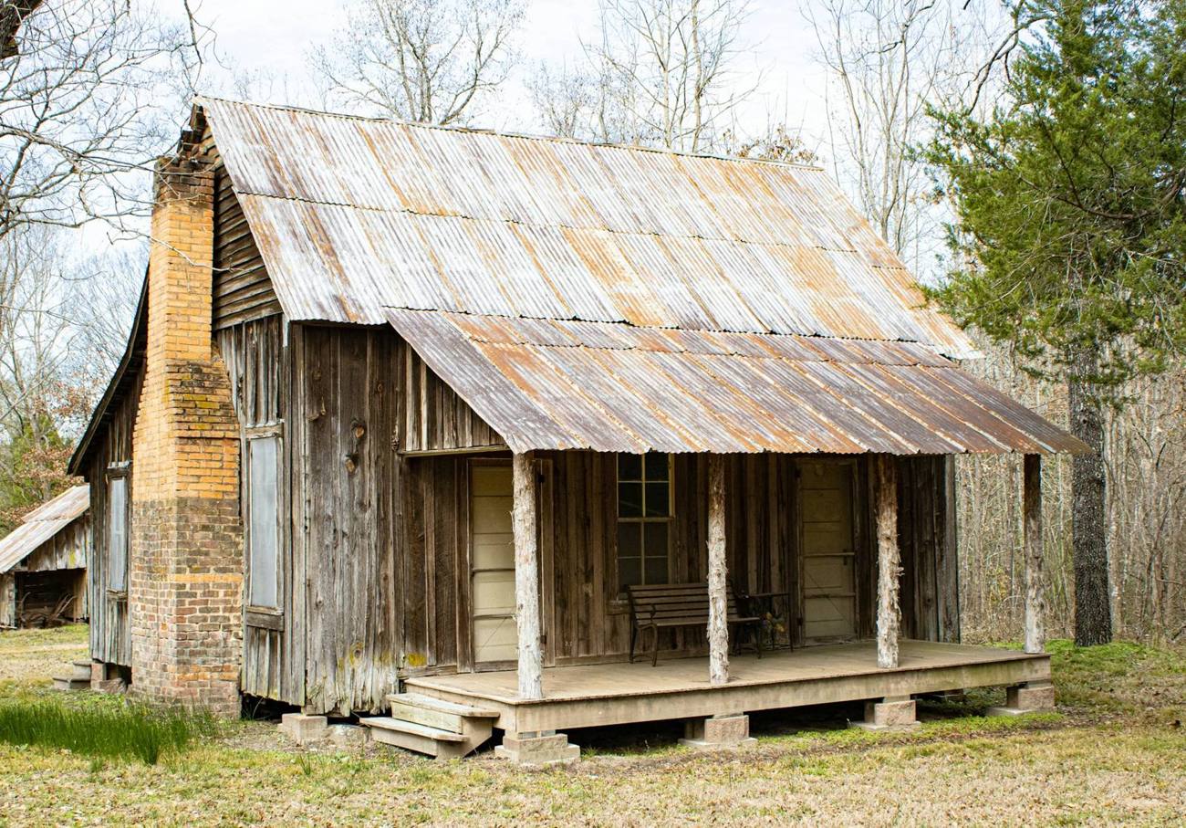 Weathered tenant house with a tin roof near Rusk, Texas
